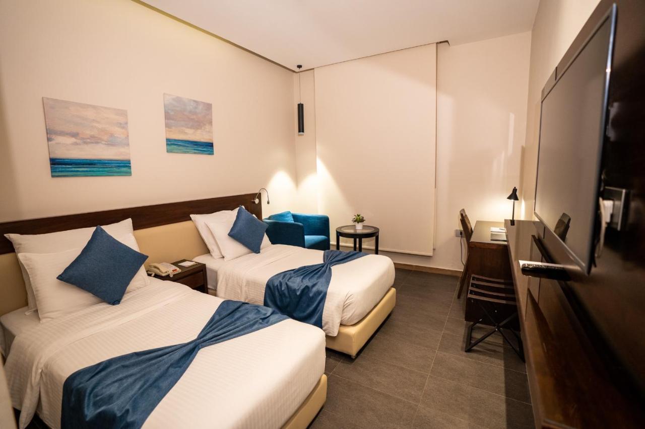 The Compass Hotel Amman Exterior photo