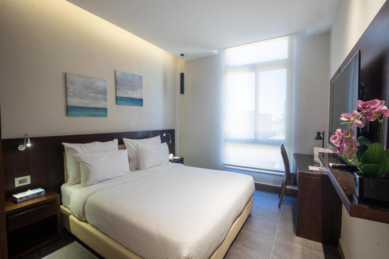 The Compass Hotel Amman Exterior photo